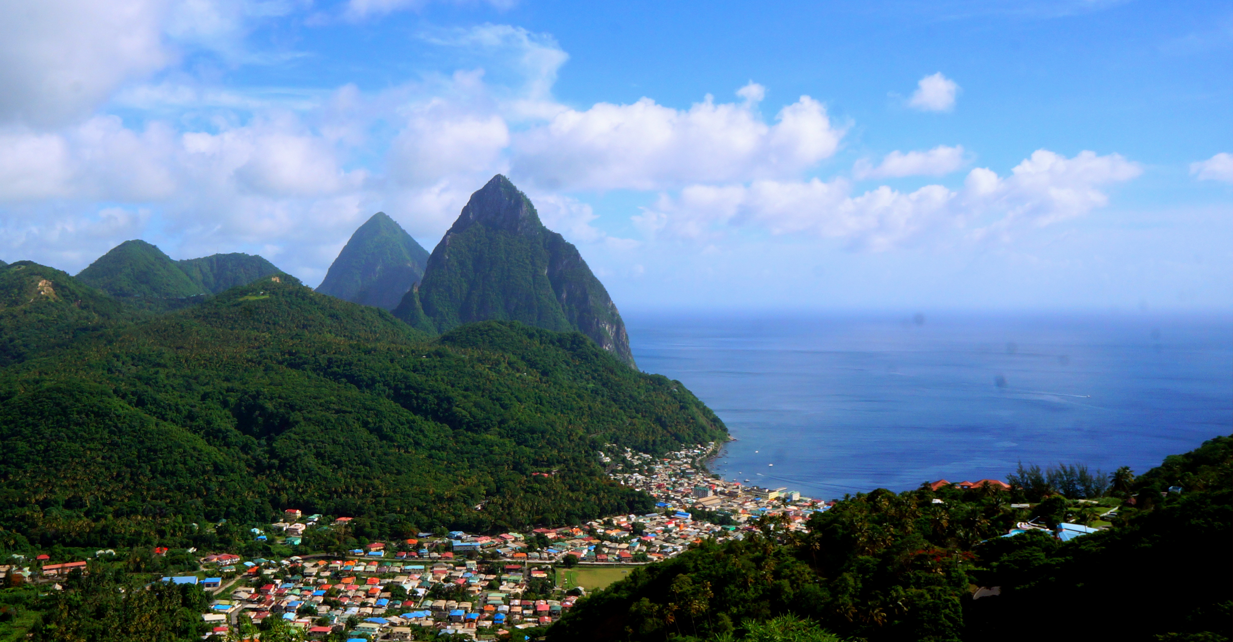 The Saint Lucia Pitons above Soufrière town and its Caribbean coast